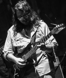 mike guitar bio.jpg